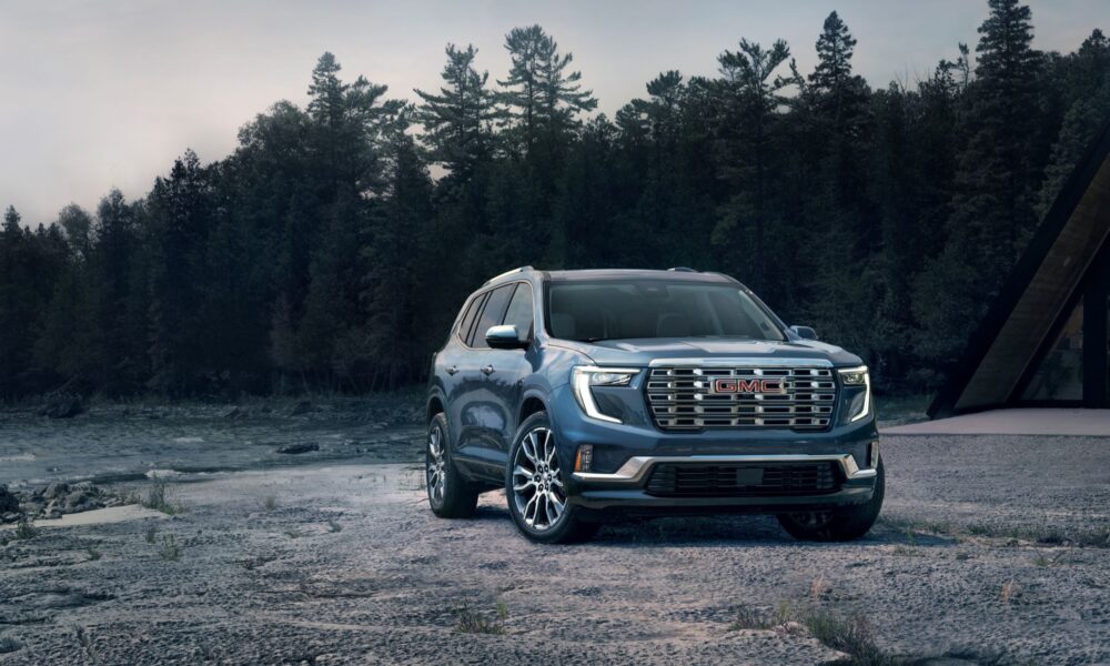 a front-three-quarter shot of a GMC Acadia parked outdoors