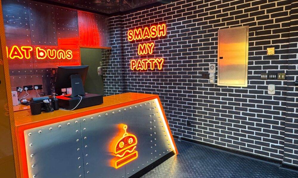 a side-angle shot of the interior of the PHAT Buns Sharjah outlet