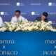 Image of individual signing at the Mantra properties
