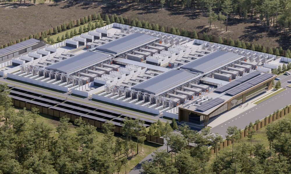 Aerial view of Vertiv OneCore scalable prefabricated data center facility surrounded by greenery.