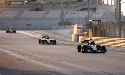 action shot of cars racing on the track at the Abu Dhabi Autonomous Racing League