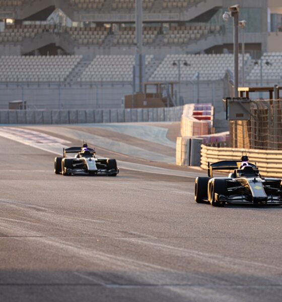 action shot of cars racing on the track at the Abu Dhabi Autonomous Racing League