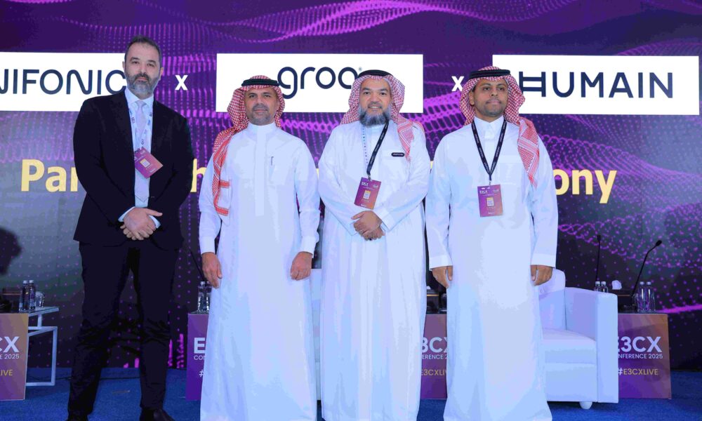 Ayman Hamdan, Co-founder of Unifonic and others from Unifonic on the stage at an event