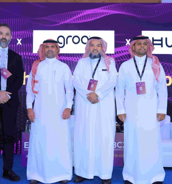 Ayman Hamdan, Co-founder of Unifonic and others from Unifonic on the stage at an event