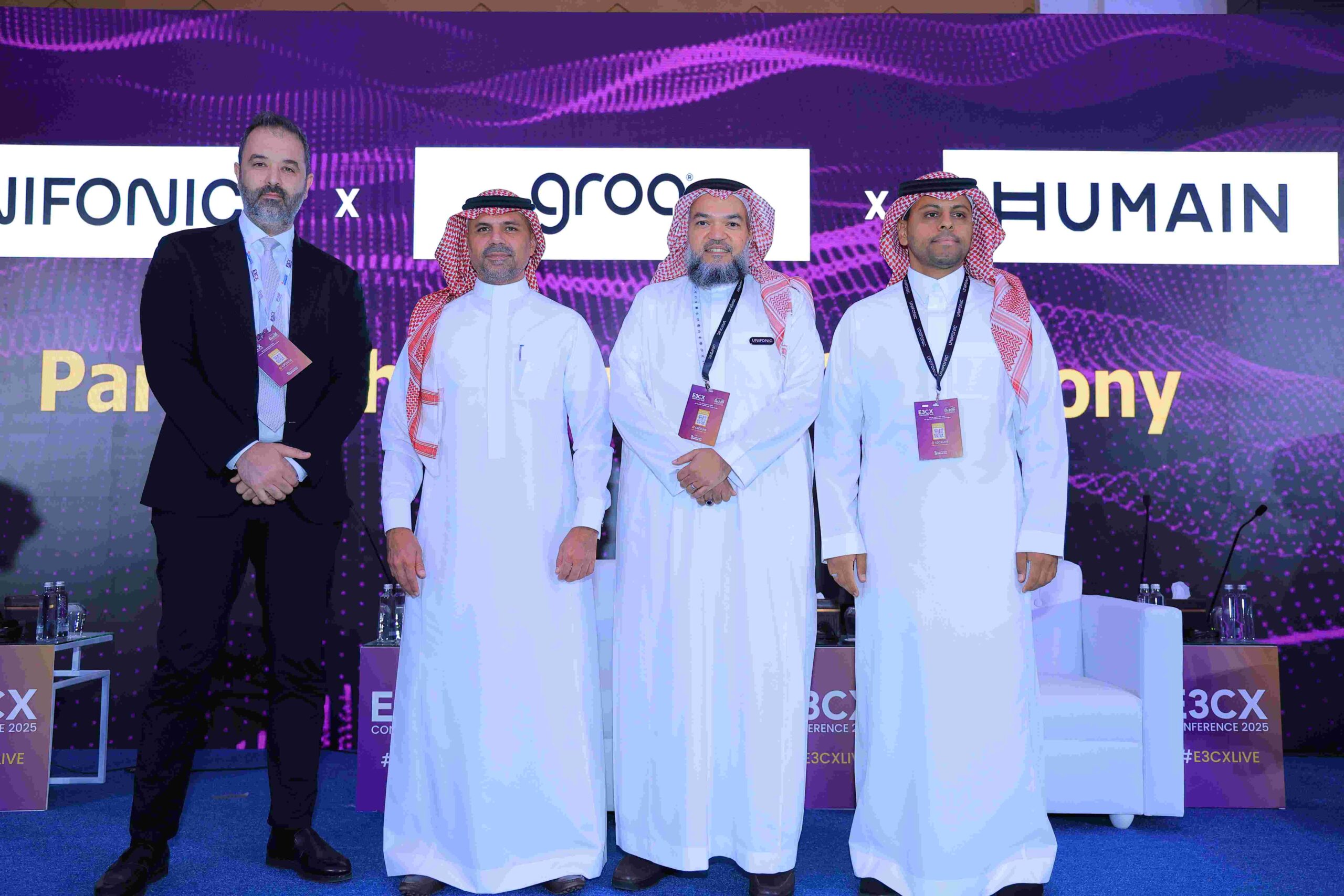 Ayman Hamdan, Co-founder of Unifonic and others from Unifonic on the stage at an event