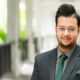 Dr. Sreejit Chakrabarty, Group Head of Technology, AI & Innovation at Fortes Education, in professional attire at the Dubai office.Retry