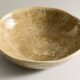 Handcrafted ceramic bowl with speckled earthy glaze finish from Zara Home Autumn Winter 2025 collection.