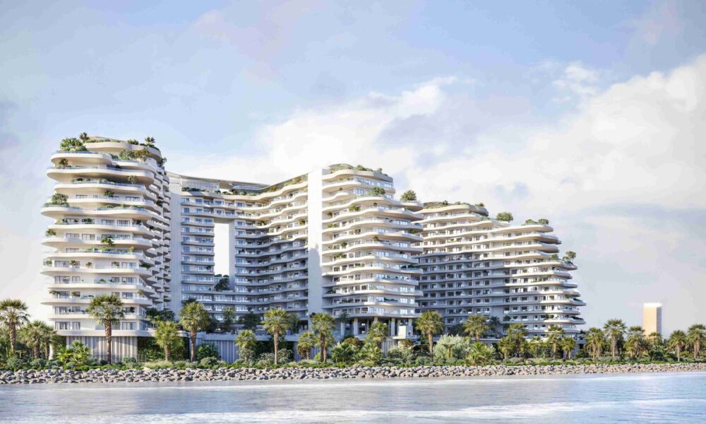 Miraggio luxury waterfront development by Source of Fate on Al Marjan Island, Ras Al Khaimah, featuring curved architecture with landscaped terraces and beachfront access.