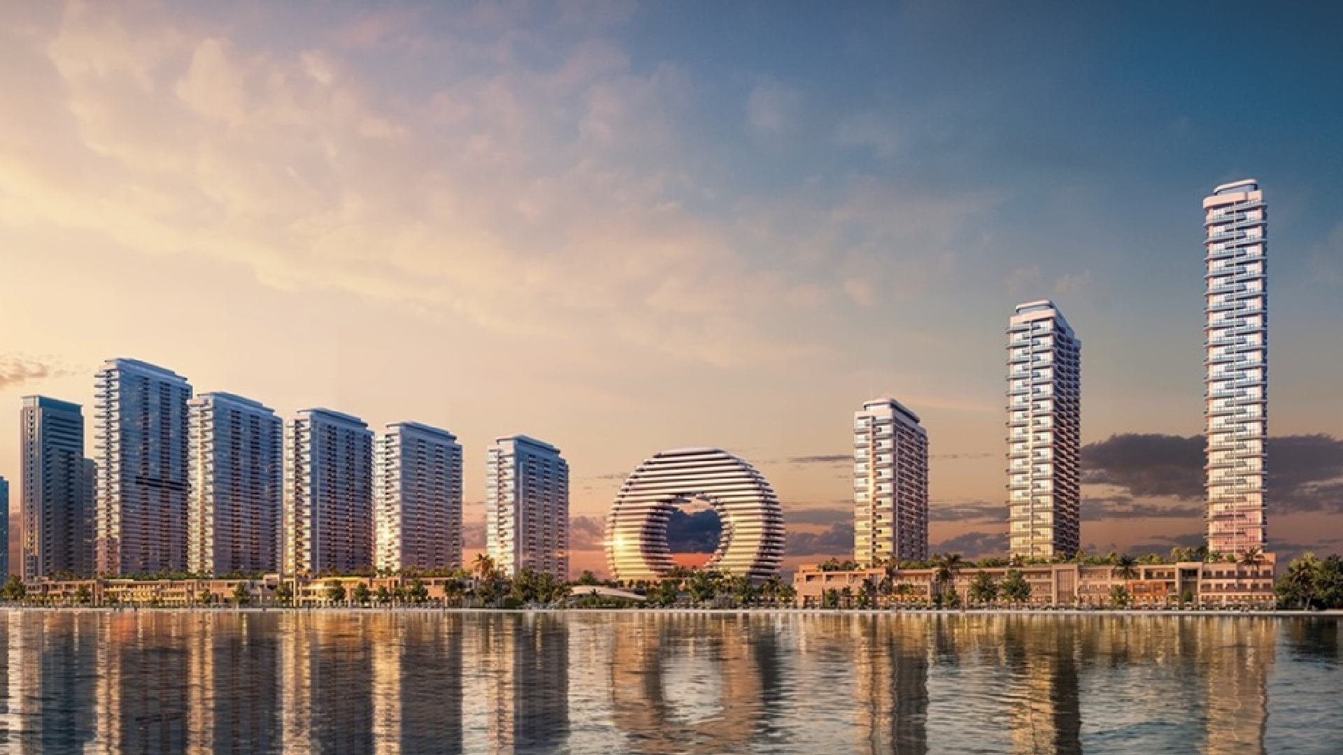 Downtown UAQ Sobha Realty waterfront master development rendering showing residential towers and circular landmark building at sunset
