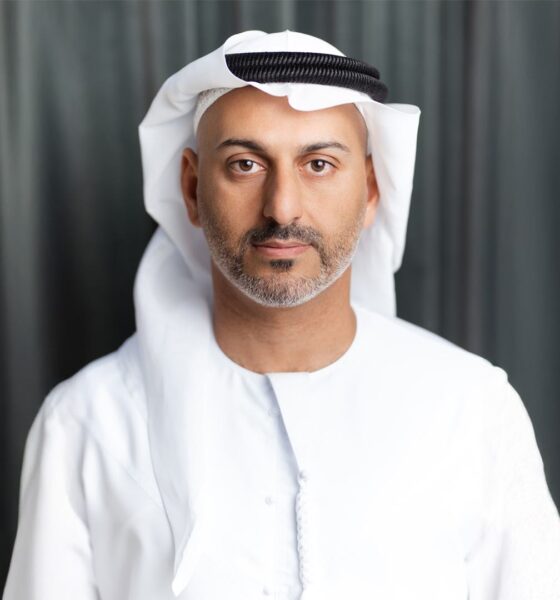 Professional portrait of Francis Alfred, Managing Director of Sobha Realty, wearing traditional white kandura and ghutra in formal business setting
