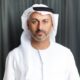 Professional portrait of Francis Alfred, Managing Director of Sobha Realty, wearing traditional white kandura and ghutra in formal business setting