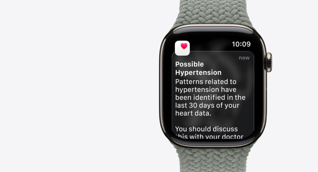An indoor product shot of the new Apple Watch Series 11 displaying hypertension alert.