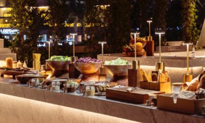Grill by ME outdoor buffet station at ME by Meliá Dubai with fresh salads, grills, and interactive dining setup at poolside terrace