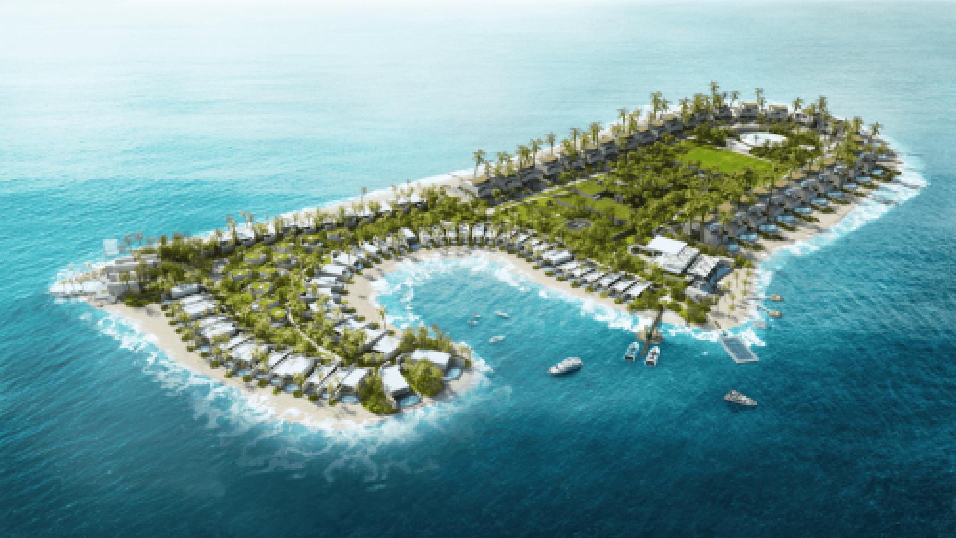 Aerial view of heart-shaped tropical island development with white villas, palm trees, and turquoise waters