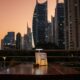 Kima Izakaya outdoor terrace table at sunset with JLT Dubai skyline view in background