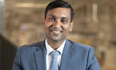 Image 1: "Luxury double-height living room with Sobha Furniture custom cabinetry, neutral upholstery, and modern chandelier" Image 2: "Anuj Jain, CEO of Sobha Furniture, in professional business attire