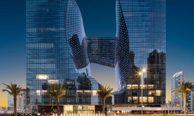 ME Dubai hotel illuminated at dusk with Michelin Guide 2025 logo overlay