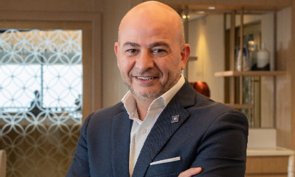 Khalid Saeed, General Manager of Al Habtoor Grand Resort, Autograph Collection, posing for a professional portrait.