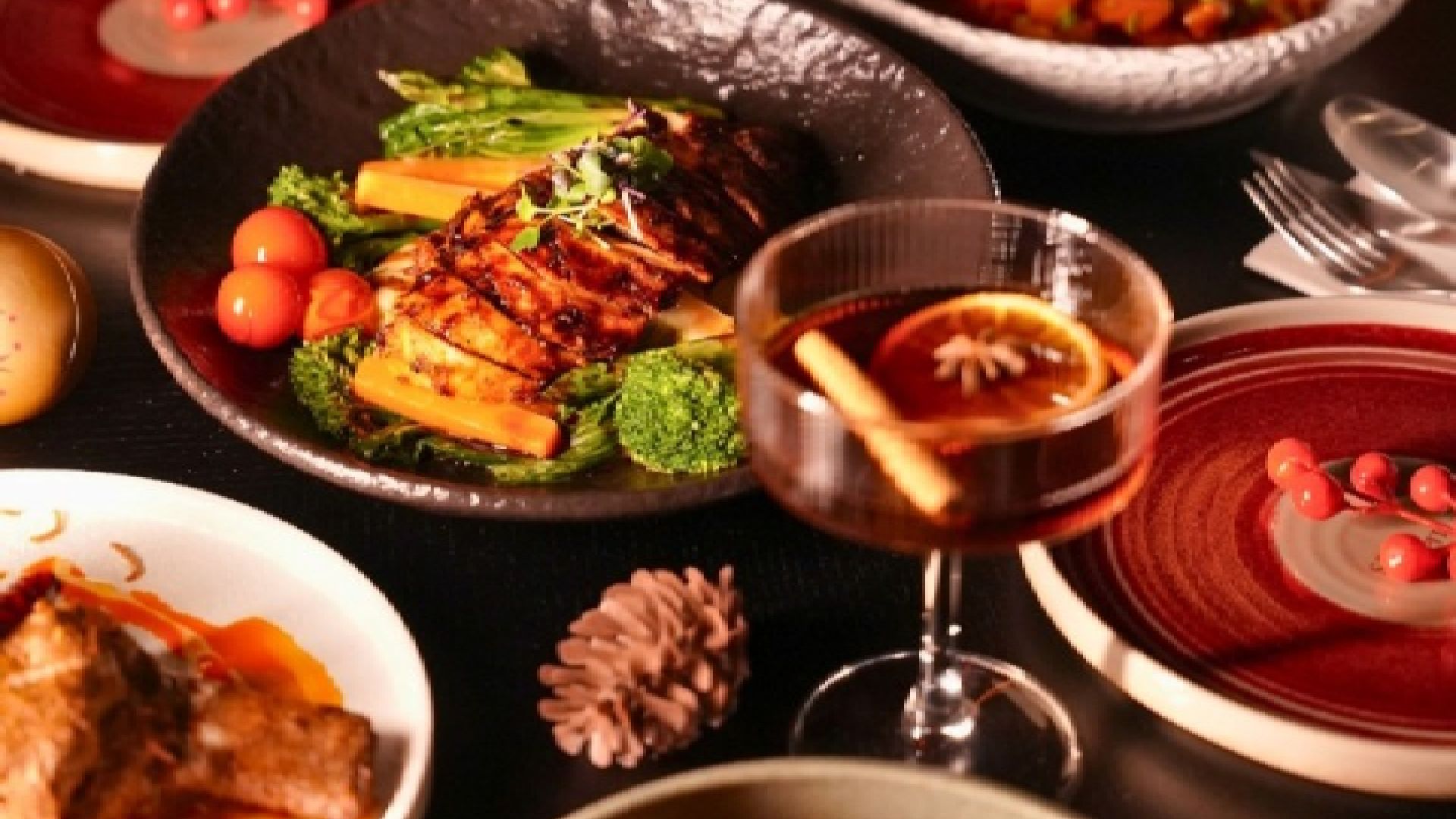 A festive table setting at Silk Lantern in Jebel Ali Recreation Club, featuring a pan-Asian 3-course sharing feast with bold, expressive dishes inspired by Asian culinary heritage.