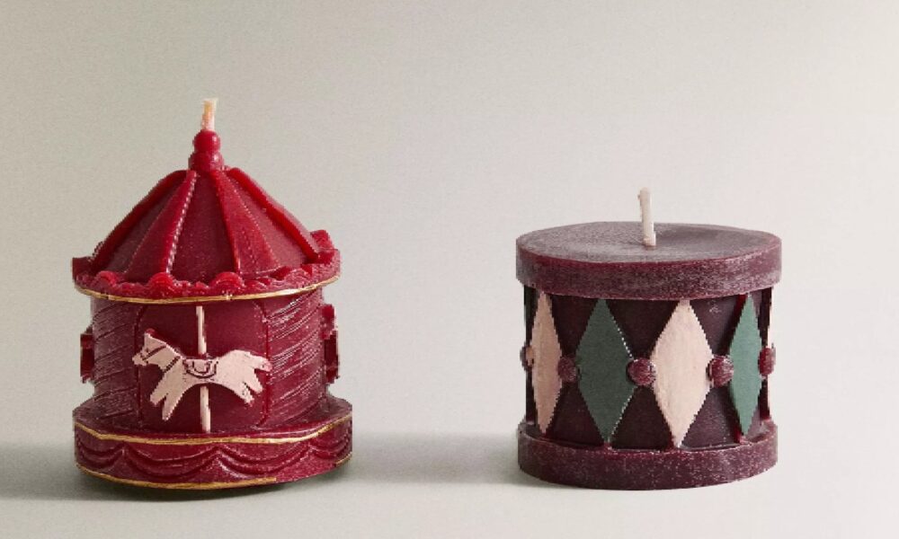Decorative scented candles shaped like a gingerbread house, a nutcracker, and a Christmas tree, part of the Zara Home winter fragrance collection.