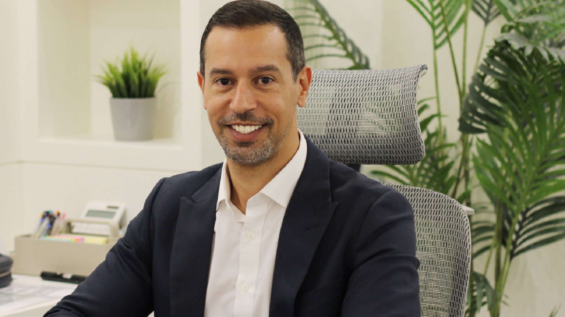 Professional portrait of Sherif Nagy, Chief Executive Officer of ME FITOUT, smiling in a business suit