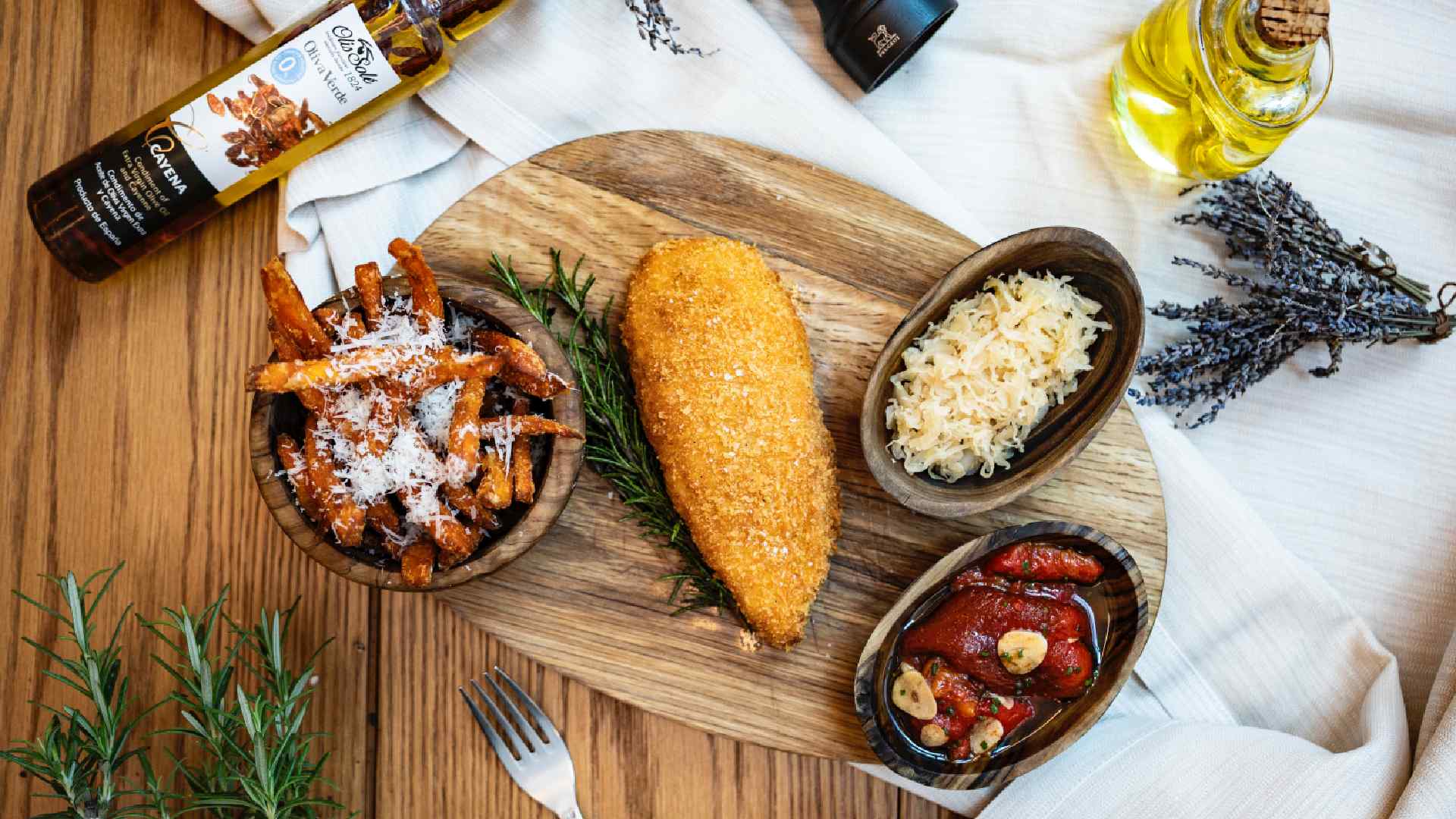 A beautifully plated festive turkey or roast chicken dish, carved and served with roasted root vegetables, herbs, and gravy, likely from Central Restaurant at MELIÁ DUBAI
