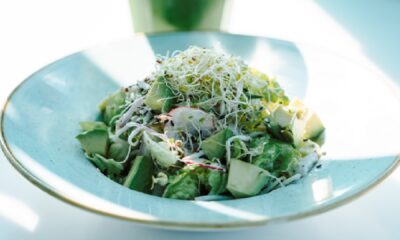 The Tuscan Garden Salad from SKM’D Café, showing a colorful, crisp mix of baby gem, sprouts, red radish, and healthy seeds, elevated with a creamy Italian dressing.