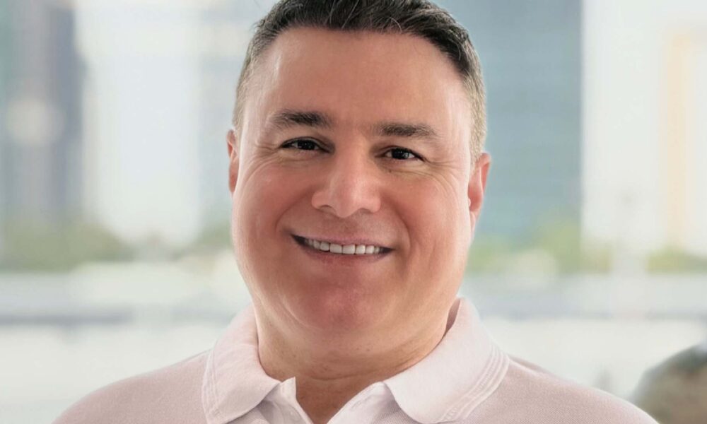 A professional portrait of Farid Yousefi, Founder and CEO of Finder Group Ai, an AI-powered venture builder in Dubai. He is an innovative leader with a distinguished beard and dark hair, dressed in a sharp navy blue suit and a white dress shirt, looking directly at the camera with an authoritative and visionary expression. The background is a clean, modern corporate setting that reflects the sophisticated GCC AI infrastructure and venture capital landscape discussed in the article