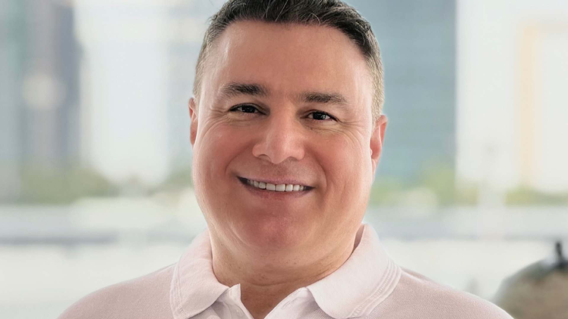 A professional portrait of Farid Yousefi, Founder and CEO of Finder Group Ai, an AI-powered venture builder in Dubai. He is an innovative leader with a distinguished beard and dark hair, dressed in a sharp navy blue suit and a white dress shirt, looking directly at the camera with an authoritative and visionary expression. The background is a clean, modern corporate setting that reflects the sophisticated GCC AI infrastructure and venture capital landscape discussed in the article