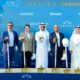 Groundbreaking ceremony for the RICHMIND Oystra project, showing the project team and executives posing with ceremonial shovels in the desert location on Al Marjan Island, Ras Al Khaimah