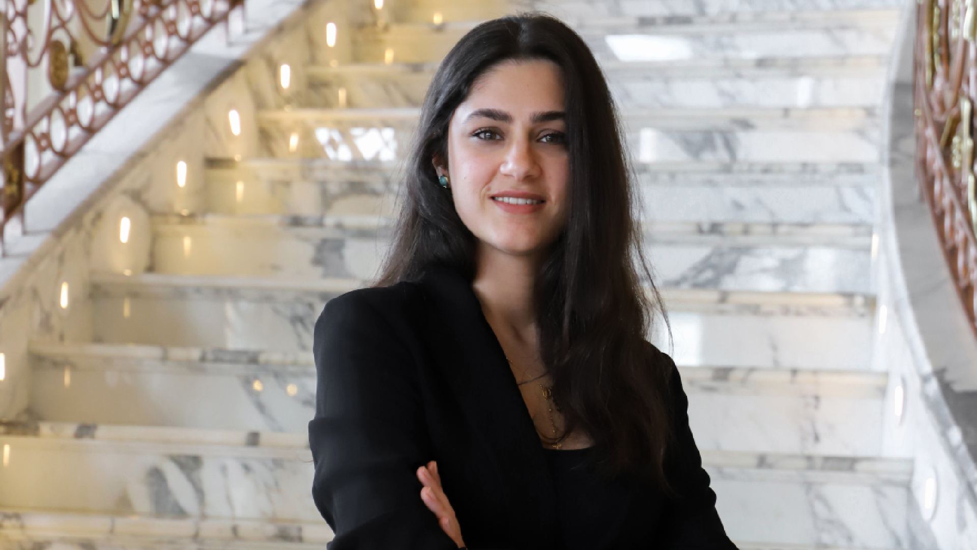 Professional headshot of Maria Turkmani, newly appointed Multi-Property Marketing & PR Manager for the MARRIOTT INTERNATIONAL Dubai Al Jaddaf cluster, smiling in a business suit.