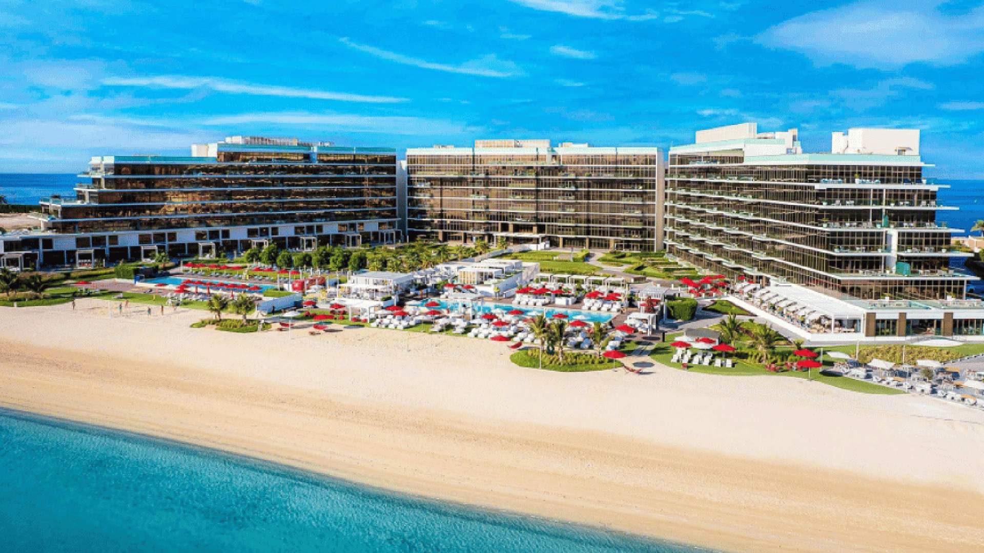 A serene, modern interior of the Pure by Serenity spa at Th8 Palm Dubai Beach Resort, featuring soft lighting, natural wood accents, and a luxurious massage or treatment bed