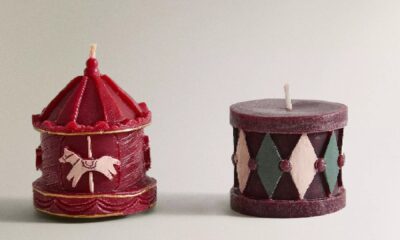 Decorative scented candles shaped like a gingerbread house, a nutcracker, and a Christmas tree, part of the Zara Home winter fragrance collection.