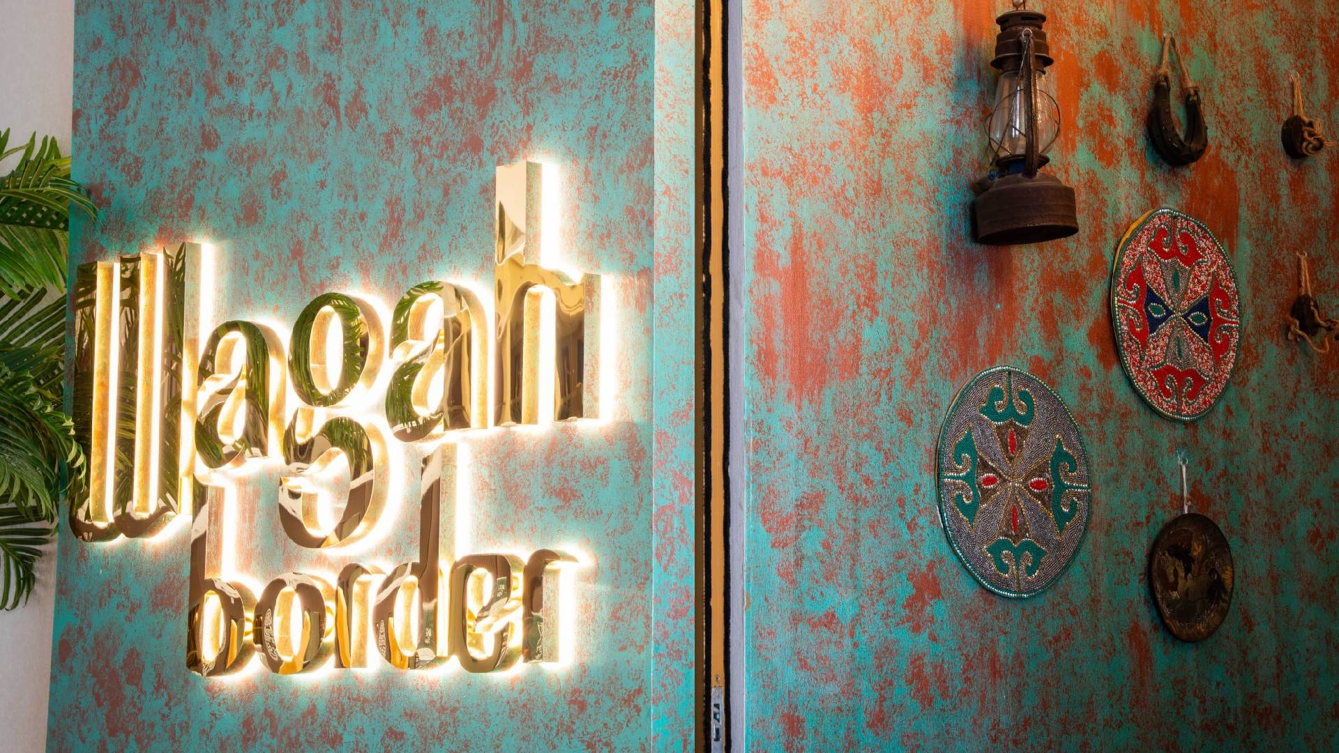 The warm, inviting, and traditional Indo-Pak inspired interior dining area of the new Wagah Border restaurant in Dubai.