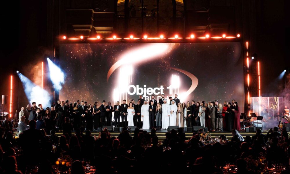 A professional photograph of Tatiana Tonu, CEO of Object 1 Real Estate Development, addressing an audience at the 'Meet & Greet' networking event at the Emirates Palace Mandarin Oriental