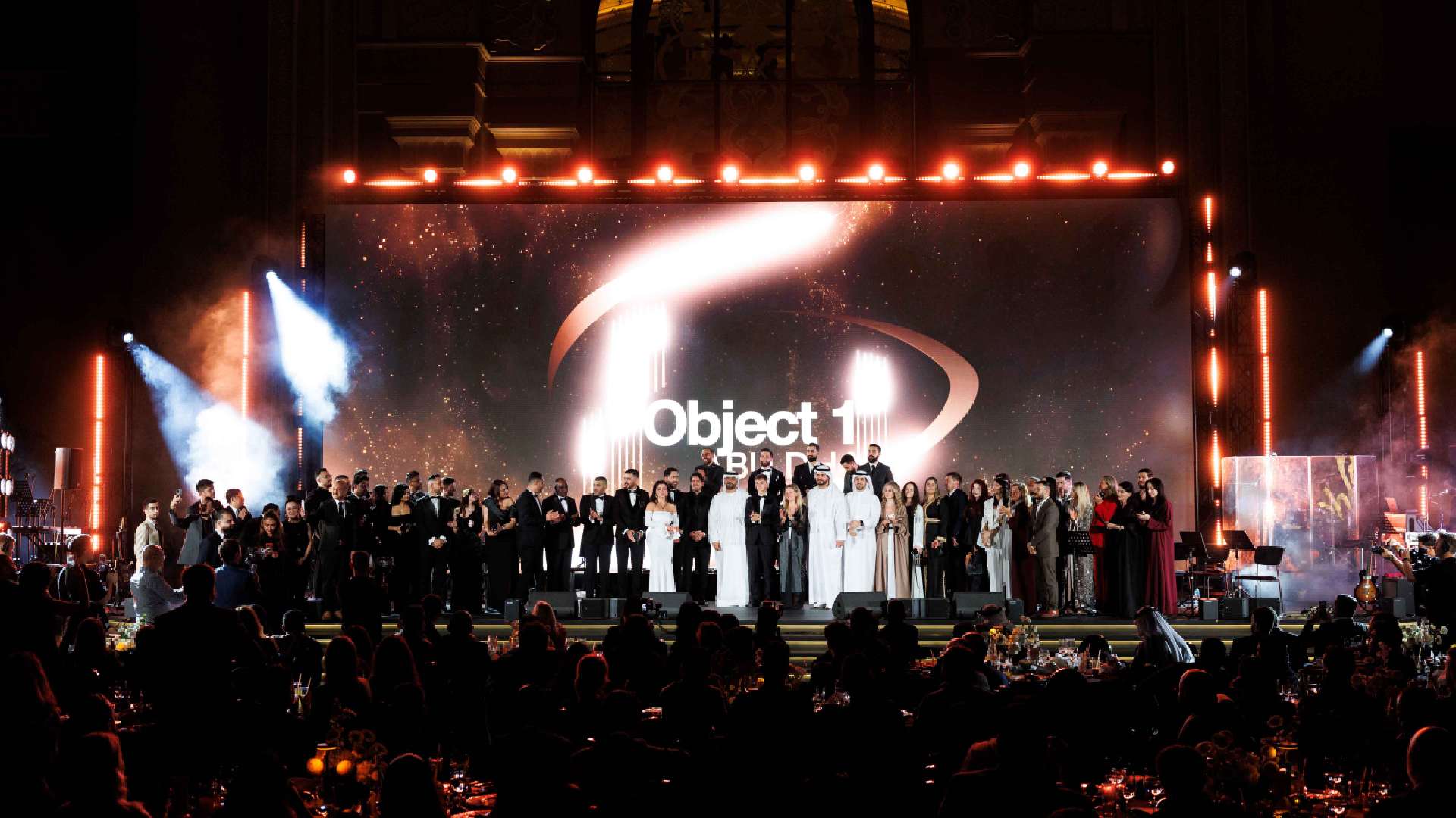 A professional photograph of Tatiana Tonu, CEO of Object 1 Real Estate Development, addressing an audience at the 'Meet & Greet' networking event at the Emirates Palace Mandarin Oriental
