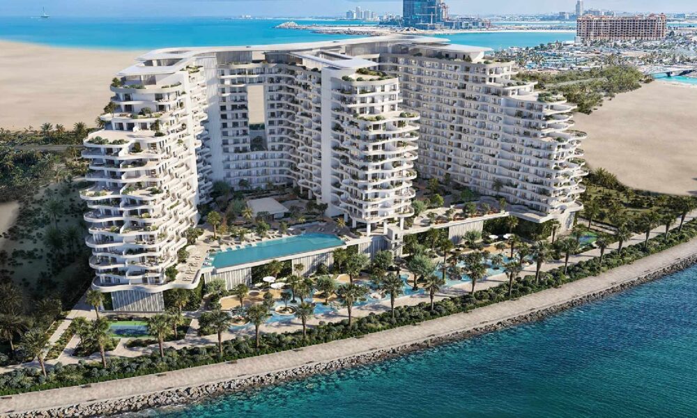 A modern, multi-story seaside residential building, "Miraggio," with numerous balconies and glass facades, is rendered digitally against a blue sky, showcasing its luxury design.