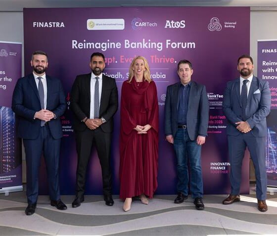 A group photo of Finastra official at a brand event in Saudi Arabia