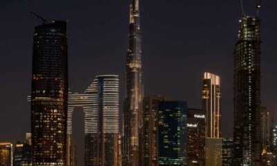 Nighttime cityscape view from LA VILLE HOTEL & SUITES showing the illuminated Burj Khalifa and Downtown Dubai skyline.