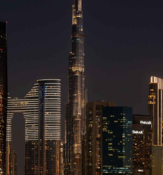 Nighttime cityscape view from LA VILLE HOTEL & SUITES showing the illuminated Burj Khalifa and Downtown Dubai skyline.