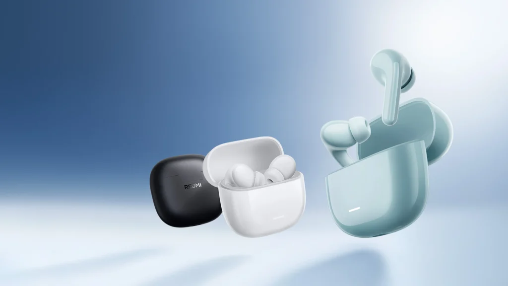 A composite image showing the Redmi Buds 8 Lite in three colors: Night Black, Cloud White, and Coral Green (light blue). Each pair of earbuds is shown next to its matching oval charging case, featuring a glossy decorative strip and a minimalist, ergonomic in-ear design.