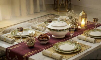 Ramadan dining table set by JASHANMAL featuring elegant dinnerware, dates bowl, lantern, and coordinated table linens for iftar.